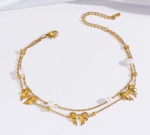 Tobilleras de Moda con Diseño Exclusivo Recién Desarrollado, Chapadas en Oro, de Acero de Titanio, con Lazo y Perla - Product Image 5