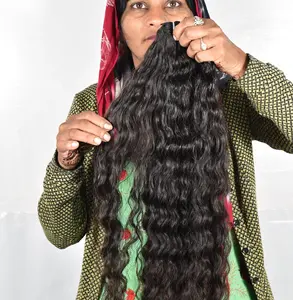 Harga pabrik grosir ekstensi rambut manusia menenun bundel keriting mentah alami tanpa proses rambut manusia India virgin
