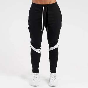 Men's Spring Autumn Sports Pants <b>Loose</b> <b>Fitting</b> Male Casual <b>Trousers</b> with Print Pattern and Logo on Waist for Running Training - Product Image 1