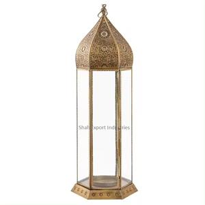 Linterna de vela alta de Metal y vidrio de nuevo estilo, acabado dorado para linternas decorativas de mesa de boda y Navidad - Product Image 1