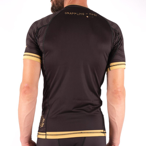 Haute qualité MMA personnalisé éruption pour la formation à manches courtes Compression Spandex toile conception solide enfants hommes BJJ combat - Product Image 4