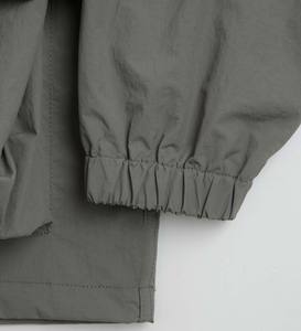 Chaqueta cortavientos de nailon personalizada al por mayor para hombre con logotipo transpirable cremallera completa con capucha estilo deportivo largo grosor fino - Product Image 6