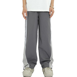 Vente en gros Pantalon en nylon pour homme Pantalon de survêtement coupe-vent en nylon personnalisé Pantalon de survêtement patchwork en nylon à rayures latérales Pantalon pour homme - Product Image 6