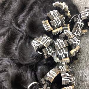 Meilleure vente 100% extensions de cheveux crus vietnamiens en gros Machine à ruban adhésif de style ondulé naturel Double trame Meilleure vente - Product Image 5