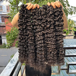 Venta al por mayor rizos birmanos mechones de pelo crudo sin procesar Virgen Natural 100% vendedores de pelo rizado birmano crudo vietnamita - Product Image 1