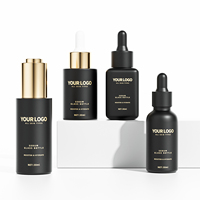 Emballage de soins de la peau en verre de luxe de 1oz estampage à chaud 30 ml pompe de presse bouteille de sérum compte-gouttes noir givré