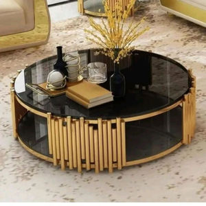 Table basse de qualité supérieure en métal, plaquée or de haute qualité, élégante et design, de forme ronde, encadrée d'un verre noir - Product Image 1