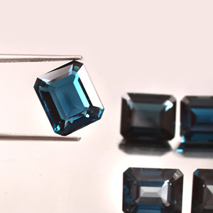 Calidad AAA Natural London Blue Topaz Octagon Emerald Cut 12x10 Piedra preciosa suelta Piedra azul Fabricante de joyas - Product Image 2