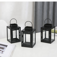 Vente en gros de porte-bougies en métal rétro |   Lanternes en fer forgé minimalistes pour décorations de table de Noël, de mariage ou de fête