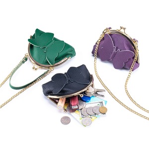 Sac Ando en cuir de vache véritable, mini porte-monnaie, sac bandoulière à chaîne avec fermoir papillon - Product Image 1