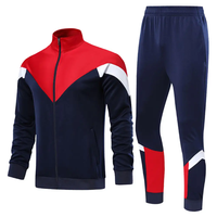 Ensemble de survêtement pour homme en polyester bleu, noir et blanc à chevrons, veste zippée et pantalon, tenue de sport athlétique, vêtements d'entraînement, fabricant