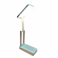 Lampe de bureau à LED rechargeable moderne avec abat-jour rond à gradation à commande tactile accumulateur blanc/cyan et alimentation secteur pour une utilisation en chambre