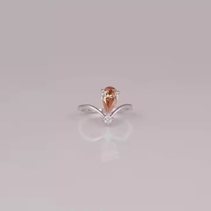 แหวนชุบทองและได้รับการรับรองสำหรับห้องปฏิบัติการทำจาก18KT ลูกแพร์สีชมพูและตัดกลม - Product Image 1