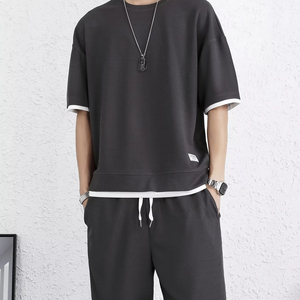 ชุดเสื้อผ้าชั้นนอกลำลองระบายอากาศได้ดีสำหรับผู้ชายผ้าไนลอนแห้งเร็วพร้อมโลโก้ออกแบบได้ตามต้องการ - Product Image 1