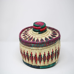 Artisan-made moonj grass decorative plate featuring a vibrant red and green sunburst design, available at wholesale price. - Product Image 2