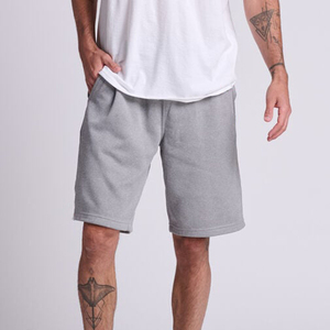 Pantalones cortos de baloncesto para hombre personalizados de alta calidad de algodón de 5 pulgadas con bolsillos personalizados de patrón sólido liso - Product Image 1
