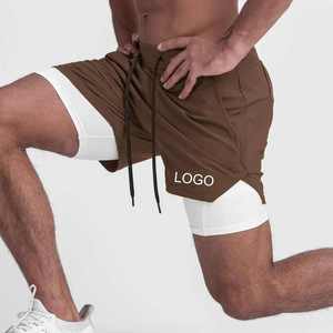 Pantalones cortos de entrenamiento atléticos de gimnasio de secado rápido para hombres Pantalones cortos calientes 2 en 1 para hombres Casual con bolsillos para teléfono - Product Image 3