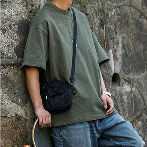 Camiseta lisa de algodón 100% de alta calidad para hombre, corte holgado, logotipo personalizado, manga caída, cuello redondo, ropa de calle de verano, informal personalizable - Product Image 2