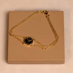 NOVAMART Fine Silverings 925 Sterling <b>Silver</b> <b>Charm</b> <b>Bracelet</b> with Black Onyx & Gold 'Peace Out' Design Wholesale Export - Product Image 1