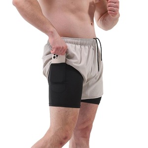 Shorts de sport athlétiques respirants écologiques à double couche solides, anti-rides, à séchage rapide, avec logo personnalisé de haute qualité - Product Image 6