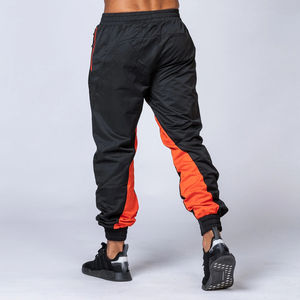 Conjunto de ropa deportiva para hombre de 2 piezas con logotipo personalizado, pantalones de chándal de poliéster 100% cortavientos, ropa de entrenamiento de invierno, conjunto de Sudadera con capucha de primavera - Product Image 6