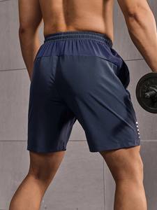 Shorts de sport pour homme en maille respirante à séchage rapide, couleur unie bleu marine, poche latérale zippée et taille à cordon de serrage - Product Image 2