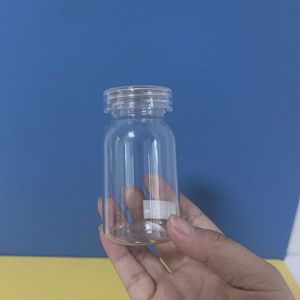 Vente en gros <span class=keywords><strong>de</strong></span> 100ml pour contenants transparents pour comprimés en PET, bocaux <span class=keywords><strong>de</strong></span> 60 bouchons, bouteille <span class=keywords><strong>de</strong></span> supplément <span class=keywords><strong>de</strong></span> pilule <span class=keywords><strong>recyclable</strong></span> avec <span class=keywords><strong>de</strong></span> l'or pour bouchons transparents pour soda - Product Image 4