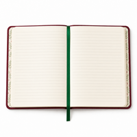 Diario personalizado LABON de Navidad con diseño de Cascanueces, tapa dura color burdeos, estrella dorada bordada, flor rosa y páginas rayadas con motivos de árbol de Navidad.