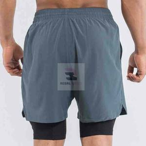 Pantalones cortos deportivos de doble capa con logotipo personalizado unisex con patrón sólido de cintura elástica y decoración informal de encaje - Product Image 2