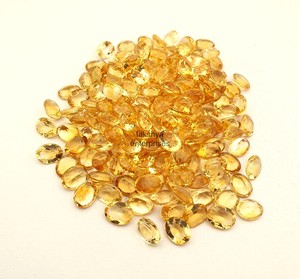 Cuentas de piedras preciosas facetadas de corte ovalado citrino de 7x9mm, cuentas sueltas de piedra calibrada citrino para la fabricación de joyas del fabricante indio - Product Image 1
