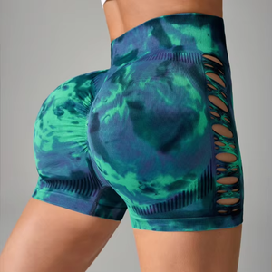 Pantalones cortos deportivos Tie-Dye para mujer Pantalones cortos de Yoga de tres cuartos para levantamiento de cadera de malla hueca - Product Image 1