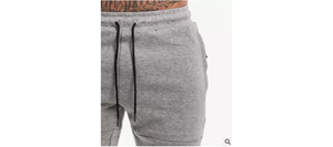 กางเกงวิ่งออกกำลังกายผู้ชาย ออกแบบโลโก้เองได้ เอวยางยืด แห้งเร็ว ระบายอากาศดี ผ้าฝ้าย 100% ลายเรียบ ปรับแต่งได้ - Product Image 6