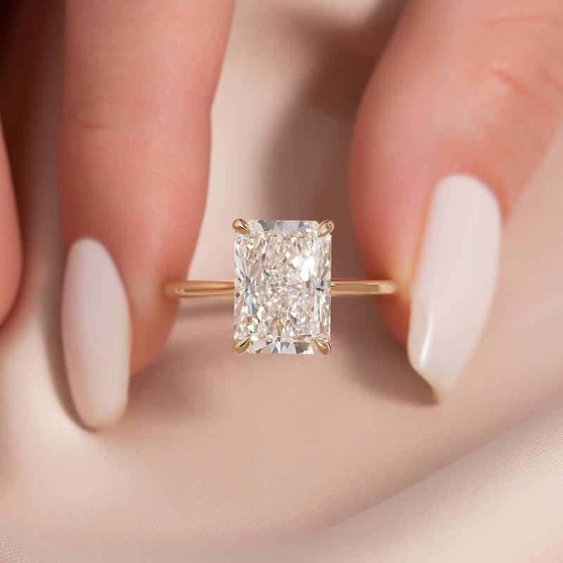 Emerald Cut 10x7mm Moissanite Three Stone