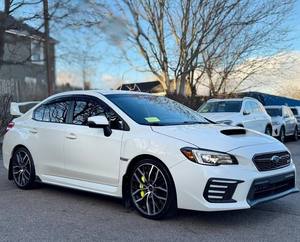 Subaru WRX STI Limited AWD 2022 blanc fin avec aileron arrière, d'occasion, avec toit ouvrant, sièges en cuir, boîte manuelle, jantes en alliage, navigation - Product Image 1