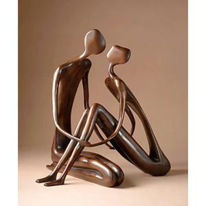 Escultura de metal de pareja besándose de estilo modernista, captura la ternura del amor en una forma artística elegante, increíblemente hecha por ARTISTIQUE - Product Image 4