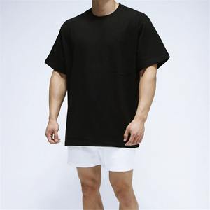 Vente en gros d'usine Hauts à manches courtes 100% coton pour hommes Logo de lavage personnalisé avec motif solide surdimensionné T-shirts vierges - Product Image 1