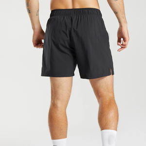 Pantalones cortos de gimnasio elásticos impermeables negros para hombre, venta al por mayor, estampado liso, cintura elástica, ropa deportiva, patrón sólido, tarifas baratas - Product Image 2