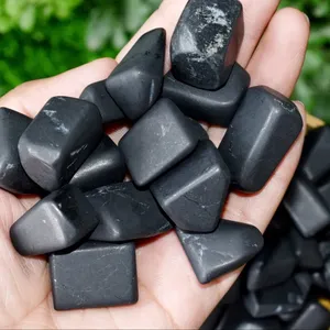 High quality natural black shungite hand polished tumbled stones for electricity for healing therapy or home or table decoration