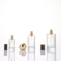 Flacon de parfum cylindrique anti-fuite 30ml 50ml 100ml, classique, à épaule plate, en verre, rechargeable, avec bouchon interchangeable
