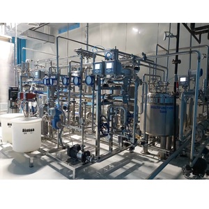 Planta embotelladora de grado industrial equipada con maquinaria de acero inoxidable y controles PLC para un funcionamiento sin problemas a la venta - Product Image 1