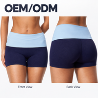 Shorts de yoga et fitness taille haute effet seconde peau, color-block, avec revers, effet push-up fessier et contrôle du ventre, en nylon et élasthanne pour femme
