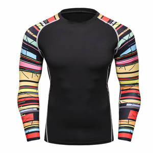 Camisas de compresión atléticas de poliéster y LICRA para entrenamiento de gimnasio de compresión de secado rápido de manga larga para hombre - Product Image 1