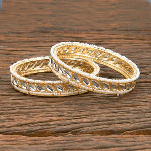 Wholesaler and Manufacturer of Gold Plated Indo Western Pearl <b>Bangles</b> With Classic Look for Ladies - Product Image 1