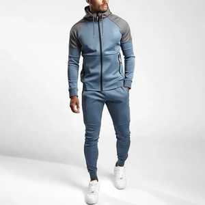 เสื้อฮู้ดมีซิปและกางเกงวิ่งผ้าฟลีซแบบไม่มียี่ห้อเสื้อวอร์มสำหรับผู้ชายสีเย็บปะติด - Product Image 4