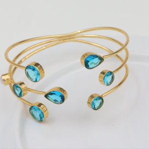 Elegante pulsera de oro de 18K con piedras preciosas en forma de lágrima Exquisita pieza de joyería de lujo con un impresionante - Product Image 1