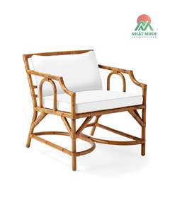 Le fauteuil en rotin tressé à la main de style bohème Isla, fabriqué en rotin naturel, présente un design esthétiquement agréable. - Product Image 1