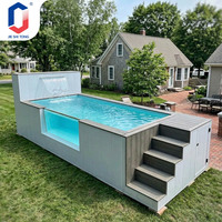 Piscine rectangulaire hors sol avec panneau latéral transparent, terrasse et cascade pour piscine extérieure dans la cour