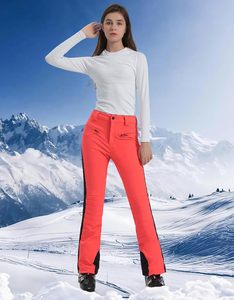 Pantalones de esquí y snowboard con aislamiento para mujer, impermeables, a prueba de viento, para invierno, para exteriores, para senderismo, cálidos, transpirables, con diseño acampanado - Product Image 2