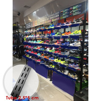 Présentoir Commercial de Vêtements en Métal Mural Vertical Personnalisé Design Tendance pour Magasin de Vêtements Haut de Gamme – Porte-T-shirts