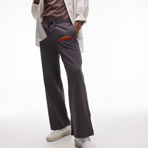 Pantalons pour hommes 100% coton de haute qualité Logo imprimé personnalisé pantalons de survêtement évasés Baggy lavés personnalisés avec des paneles sur le côté jogger pour hommes - Product Image 1